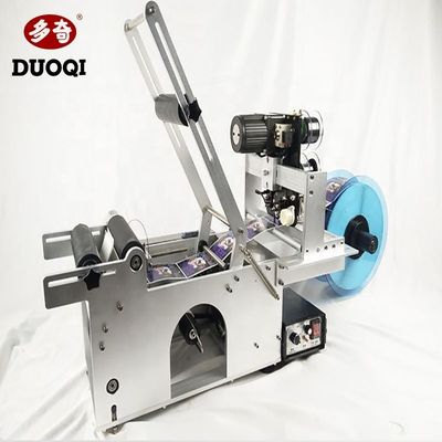 Η συσκευή σήμανσης χειροκίνητης χρήσης DUOQI MT-50 για στρογγυλές φιάλες διαφόρων μεγεθών